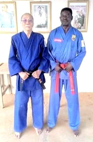 Master Nguyen Minh Kiệt with senior student O.A.G. Apollinaire (at right) in Burkina Faso, Africa