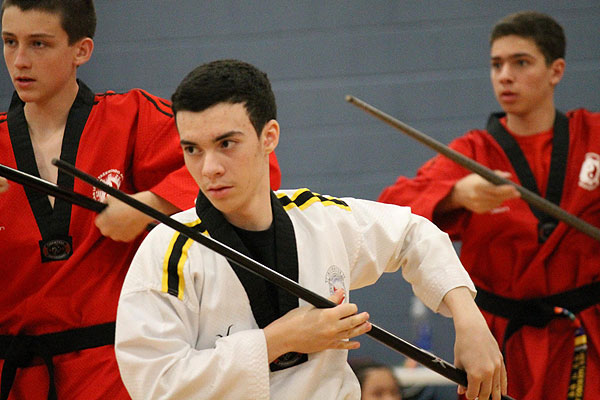 Black belt candidates must perform precisely choreographed pumsaes or forms including with traditional weapons like the nunchaku, bo or staff, and geom or sword