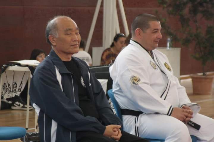 Grand Master Kim Chang-Hak with Fernando Branco at a promotion examination in Portugal in 2016.